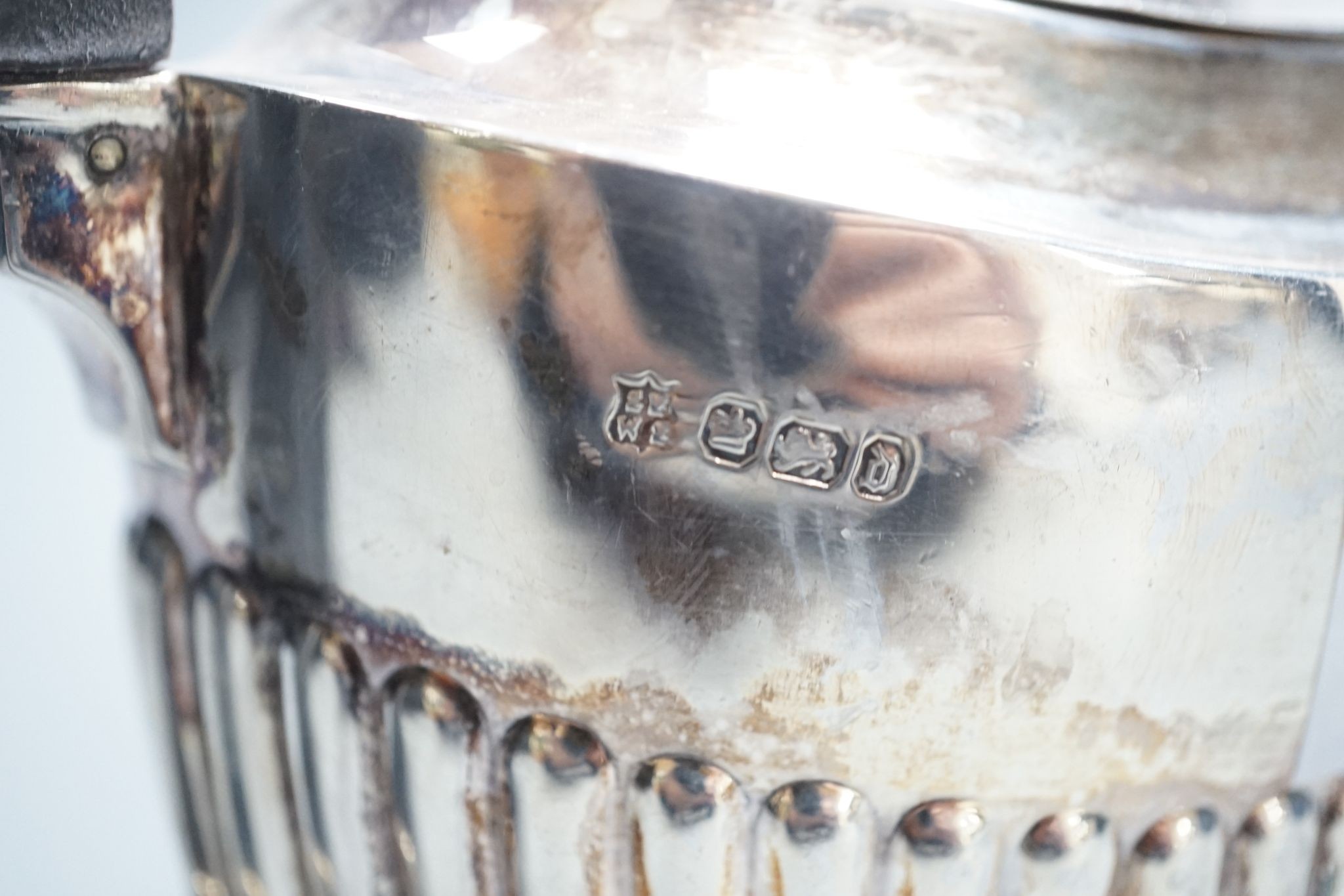 A late Victorian demi- fluted silver teapot, Sheffield, 1896, 8oz.